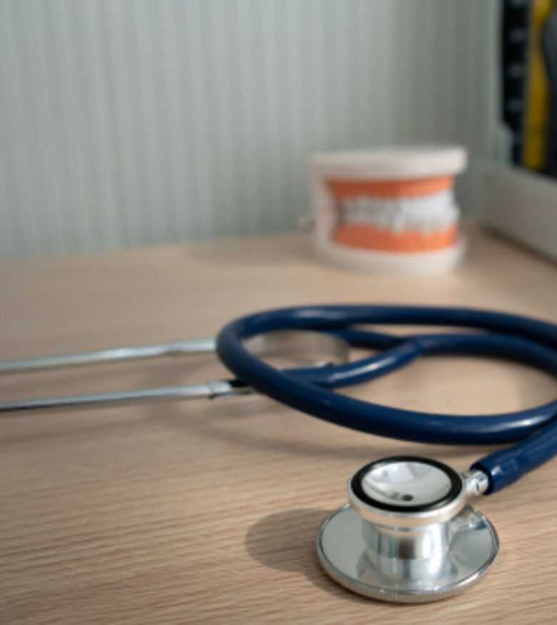 Stethoscope on a desk symbolizing medical profession