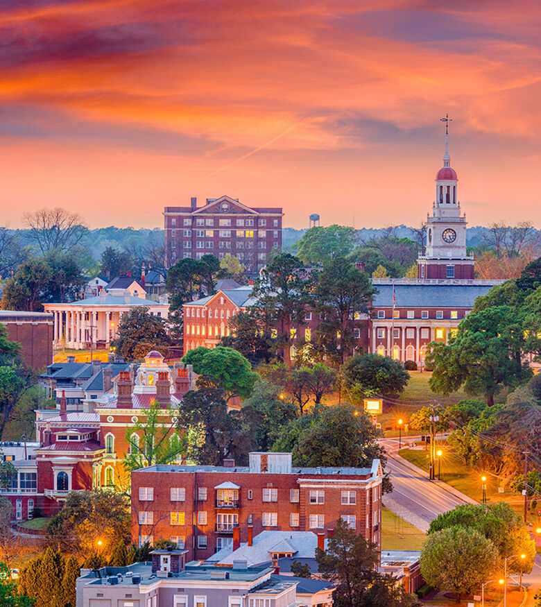 Macon cityscape at sunset, capturing the vibrant community spirit and the commitment of local personal injury lawyers.